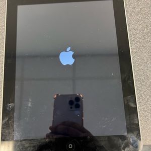 Charger included. ,no scratches also comes with a case